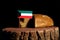 Kuwaiti flag on a stump with bread