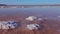 Kuyalnik estuary, Black Sea. Self-precipitating salt at the bottom and bank of the estuary. Table salt crystals