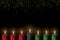 Kwanzaa holiday background with candle light of seven candle sticks in black, green, red symbolising 7 principles of African