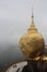 Kyaiktiyo Pagoda golden rock, myanmar Burma with cloud