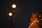 KYIV, UKRAINE - 9 JANUARY 2022: Street lantern with warm light glow near The Golden Gates of Kyiv.