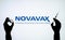 Kyiv, Ukraine - December 03, 2020: Backlit single shot image of Novavax  Covid-19 vaccine concept