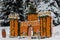 KYIV, Ukraine - December 25, 2018. A citrus castle built from thousands of fresh orange and lemons in a snowy winter coniferous fo