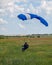 Kyiv, Ukraine - June 21, 2020: A parachutist with a parachute jumped and flew. Fly with a parachute. Sport. Copy space