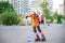 KYIV, UKRAINE JUNE 26, 2018: Attractive teenage girl roller skating on roller blades