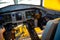 Kyiv, Ukraine - June 27, 2020: Airplane cockpit, pilot`s workplace with a steering wheel. Passenger flights. Aircraft ATR 72-212A