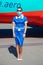 Kyiv, Ukraine - June 27, 2020: A flight attendant and a stewardess in a medical mask. Plane Windrose airline prepares to take