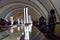 Kyiv, Ukraine - May 31, 2019. Kyiv Metro. Metro station Dorogozhychi. Figures of passengers on escalator and citylights