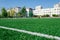 Kyiv, Ukraine - September 02, 2019. Mishugi St. School stadium. Artificial grass, white lines, soccer goal on sunny day