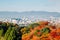 Kyoto cityscape with autumn maple in Japan