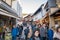 Kyoto, Japan - 2 Mar 2018: People traveler, group tour, local people, Japanese people walking and shopping, food, snacks and