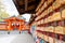 Kyoto, Japan - Apr 17, 2019 : Selective focus of Beautiful small wooden wishing plaques at Fushimi Inari shrine Kyoto, Japan