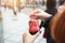 KYOTO; JAPAN - January 18; 2018 : Woman hand open a Coca Cola bo