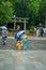 KYOTO, JAPAN - JULY 05, 2017: Young Japanese women wearing traditional Kimono and holding umbrellas in their hands in