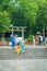 KYOTO, JAPAN - JULY 05, 2017: Young Japanese women wearing traditional Kimono and holding umbrellas in their hands in