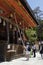 Kyoto, Japan - May 19, 2017: People ringing athe bell and praying bowing in front of the Yasaka jinja shrine in Kyoto