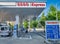 Kyoto, Japan - May 27, 2016: Esso gas station with blue colors and cars refueling