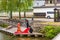 KYOTO, JAPAN - NOVEMBER 7, 2017: Couple in a kimono on the river bank. Copy space for text.