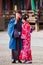 KYOTO, JAPAN - NOVEMBER 7, 2017: A loving couple in a kimono in a town square. Vertical. Copy space for text.