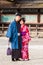 KYOTO, JAPAN - NOVEMBER 7, 2017: A loving couple in a kimono in a town square. Vertical. Copy space for text.