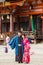 KYOTO, JAPAN - NOVEMBER 7, 2017: A loving couple in a kimono in a town square. Vertical. Copy space for text.