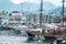 KYRENIA, CYPRUS - WINTER, 2019: Sea pier with boats, ships and yachts. Beautiful Seascape on a background of mountains