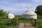 Kyrgyz village with small bridge and national traditional yurts for a nomadic lifestyle