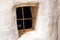 Kythira Ionian islands Greece. Venetian Castle or Fortezza. Window with rusty iron grid background