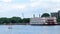 LA CROSSE, WI - 21 JUL 22: Pontoon and cruise ship on the Mississippi River