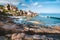 La Digue island, Seychelles. Tropical coastline with hidden beach, unique granite rocks in evening light