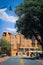 La Fonda highrise stucco hotel in Santa Fe NM USA with tourists and street market in foreground -