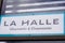 La halle shop brand logo and text sign front of clothing footwear fashion store