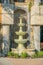 La Jolla, California- Water fountain outside a building with plants at the front