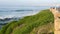 La Jolla, San Diego, CA USA -24 JAN 2020: Group of people walking on steep high cliff promenade, multiethnic pedestrians, tourists