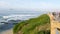 La Jolla, San Diego, CA USA -24 JAN 2020: Group of people walking on steep high cliff promenade, multiethnic pedestrians, tourists