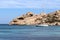 La Maddalena, Sardinia, Italy - Sailboat moors in Cala dello Spalmatore protected by the typical rocks of the bay