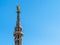 La Madonnina figure on top of Milan Cathedral