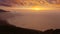 La Palma muntains sunset with orange sun in canary islands