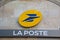 La Poste logo brand yellow store street sign text facade shop in France