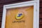 La Poste logo brand yellow store street sign text shop in France