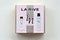 La rive IN woman deodorant and perfume bottles in brand box on beige background. LA RIVE S.A. is one of the leading producers of