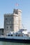 La Rochelle , Aquitaine / France - 11 19 2019 :  view of Tour de la chaine with tourist boat go to fort boyard in La Rochelle