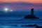 La Vieille lighthouse illuminated at night