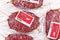 Lab grown cultured meat concept for artificial in vitro cell culture meat production with frozen packed raw meat with made up labe