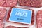 Lab grown cultured meat concept for artificial in vitro cell culture meat production with packed raw meat with made up label