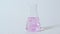 Lab research chemical test pink sample mix flask