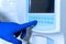 Lab technician adjusts device of very accurate medical blood test