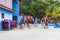LABADEE, HAITI - MAY 01, 2018: People in lifejackets preparing for a water excursion on beach in Haiti