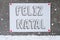 Label On Cement Wall, Snowflakes, Feliz Natal Means Merry Christmas