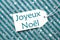 Label On Turquoise Paper, Snowflakes, Joyeux Noel Means Merry Christmas